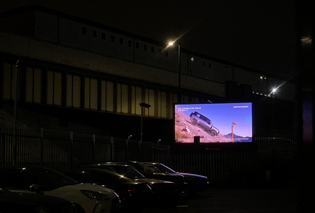 Glowing billboard of a Landrover Discovery